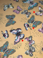 Laden Sie das Bild in den Galerie-Viewer, B-Ware/ Baumwolljersey Ocker mit Schmetterlingen
